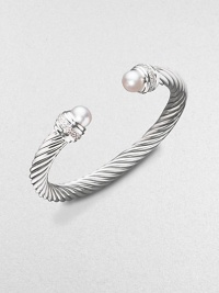 From the Silver Ice Collection. A signature Yurman cable of sterling silver, richly enhanced by bands of pavé diamonds encircling lustrous white freshwater pearl end caps. Diamonds, 0.48 tcw White freshwater pearls Sterling silver Cable, 7mm Diameter, about 2¼ Made in USA From the Silver Ice Collection. A signature Yurman cable of sterling silver, richly enhanced by bands of pavé diamonds encircling lustrous white freshwater pearl end caps. Diamonds, 0.48 tcw White freshwater pearls Sterling silver Cable, 7mm Diameter, about 2¼ Made in USA