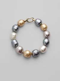 Soft shades come together in a substantial strand of lustrous baroque pearls. 14mm champagne, nuage, grey and white man-made, organic pearls 18k goldplated sterling silver spring clip clasp Length, about 8 Made in Spain Soft shades come together in a substantial strand of lustrous baroque pearls. 14mm champagne, nuage, grey and white man-made, organic pearls 18k goldplated sterling silver spring clip clasp Length, about 8 Made in Spain