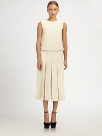 Airy chiffon insets lighten the look of this pleated, bouclé design.Banded waistPleated skirtConcealed back zipFully linedAbout 31 from natural waistFabric 1: wool/alpaca/nylonFabric 2: wool/nylon/silkFabric 3: silkDry cleanMade in Italy of imported fabricModel shown is 5'8 (172cm) wearing US size Small. Airy chiffon insets lighten the look of this pleated, bouclé design.Banded waistPleated skirtConcealed back zipFully linedAbout 31 from natural waistFabric 1: wool/alpaca/nylonFabric 2: wool/nylon/silkFabric 3: silkDry cleanMade in Italy of imported fabricModel shown is 5'8 (172cm) wearing US size Small.