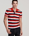 Rich in color and with a collar you can pop, this classic-fit stripe pique polo works well with jeans and shorts for a fun, smart look.