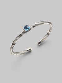 From the Noblesse Collection. Shimmering pavé diamonds frame a faceted blue topaz, delicately perched atop a cabled silver cuff. Diamonds, 0.14 tcw Blue topaz Cable, 5mm Sterling silver Diameter, about 2¼ Made in USA From the Noblesse Collection. Shimmering pavé diamonds frame a faceted blue topaz, delicately perched atop a cabled silver cuff. Diamonds, 0.14 tcw Blue topaz Cable, 5mm Sterling silver Diameter, about 2¼ Made in USA