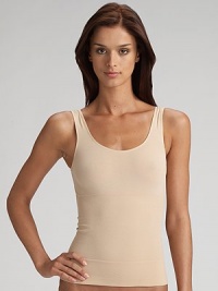 Sleek and seamless shapewear tank in an elasticized knit that instantly smooths and slims your torso. Control fabric helps smooth and slim Pull-on style Nylon/elastene/cotton Hand wash Imported Sleek and seamless shapewear tank in an elasticized knit that instantly smooths and slims your torso. Control fabric helps smooth and slim Pull-on style Nylon/elastene/cotton Hand wash Imported