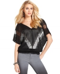 A hot layering piece, this GUESS? lace top adds an element of dark romance to your summer look! A hot layering piece, this GUESS? lace top adds an element of dark romance to your summer look!
