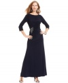 Xscape's petite gown features tailored touches like a gathered waist with beading and a crisp A-line silhouette.