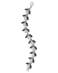 This Carolee bracelet styles your look with effortless elegance, set in silver tone plate and accented by clusters of colored crystal stones. This Carolee bracelet styles your look with effortless elegance, set in silver tone plate and accented by clusters of colored crystal stones.