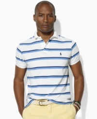 Classic stripes lend a crisp, polished look to a relaxed-fitting polo shirt in breathable cotton mesh. Classic stripes lend a crisp, polished look to a relaxed-fitting polo shirt in breathable cotton mesh.