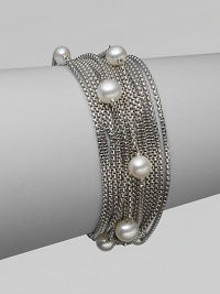 From the Pearl Collection. Multiple rows of sterling silver box chains with a random array of pearls.Pearl Sterling silver Length, about 7½ Push lock clasp closure Imported 