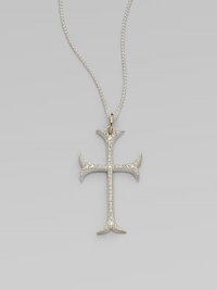 A graceful French Gothic cross sparkles with the dazzle of diamonds set in sterling silver on a woven silver chain with gold accents.Diamonds, .60 tcwSterling silver and 14k yellow goldChain length, about 18Pendant length, about 1½Spring ring claspMade in USA A graceful French Gothic cross sparkles with the dazzle of diamonds set in sterling silver on a woven silver chain with gold accents.Diamonds, .60 tcwSterling silver and 14k yellow goldChain length, about 18Pendant length, about 1½Spring ring claspMade in USA