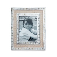 Handmade in sand-cast aluminum with a trademark blend of enamel infused with crushed mother of pearl, Julia Knight's classic picture frame features beautiful mosaic borders made of handcut Mother of Pearl tiles. Black velvet trims the back for an elegant look. Handmade in sand-cast aluminum with a trademark blend of enamel infused with crushed mother of pearl, Julia Knight's classic picture frame features beautiful mosaic borders made of handcut Mother of Pearl tiles. Black velvet trims the back for an elegant look.