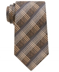 With a complementary dual pattern, this tie from Alfani is perfect for the modern man's dress wardrobe. With a complementary dual pattern, this tie from Alfani is perfect for the modern man's dress wardrobe.