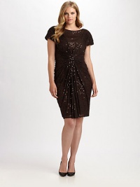 Stunning sequins add a touch of glamour to this ruched dress. The fantastic twisted front flatters your shape and helps to create a flawless silhouette.BoatneckShort sleevesTwisted frontBack zipperFully linedAbout 28 from natural waistNylonDry cleanImported Stunning sequins add a touch of glamour to this ruched dress. The fantastic twisted front flatters your shape and helps to create a flawless silhouette.BoatneckShort sleevesTwisted frontBack zipperFully linedAbout 28 from natural waistNylonDry cleanImported