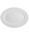 A little bit country. Made for the rigors of daily use but with an embossed design that's entirely graceful, the American Countryside oval platter from Mikasa promises well-balanced dining in classic white stoneware.