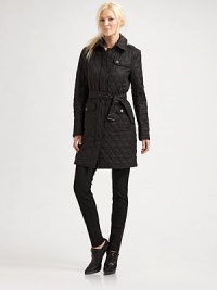 Iconic quilting adorns this must-have silhouette, complete with oversized flap pockets.Point collarLong sleevesSnap frontSelf beltButton cuffsBack yokeBack ventAbout 27 from shoulder to hemPolyesterDry cleanImportedAdditional Information Women's Premier Designer & Contemporary Size Guide Iconic quilting adorns this must-have silhouette, complete with oversized flap pockets.Point collarLong sleevesSnap frontSelf beltButton cuffsBack yokeBack ventAbout 27 from shoulder to hemPolyesterDry cleanImportedAdditional Information Women's Premier Designer & Contemporary Size Guide