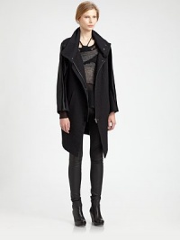 Velvety goat fur sleeves soften the urban attitude of this structured funnelneck coat. FunnelneckDropped shouldersLong sleevesFront zipper; snap closuresCropped back hemAbout 40 from shoulder to hem at longest pointBody: Linen/wool/cottonTrim: Goat furDry clean with fur specialistImported of Italian fabricFur origin: ChinaModel shown is 5'10 (177cm) wearing US size Small. Velvety goat fur sleeves soften the urban attitude of this structured funnelneck coat. FunnelneckDropped shouldersLong sleevesFront zipper; snap closuresCropped back hemAbout 40 from shoulder to hem at longest pointBody: Linen/wool/cottonTrim: Goat furDry clean with fur specialistImported of Italian fabricFur origin: ChinaModel shown is 5'10 (177cm) wearing US size Small.
