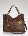 In distressed python leather, this slouchy shoulder bag from MICHAEL Michael Kors imbues a vintage vibe to any ensemble.