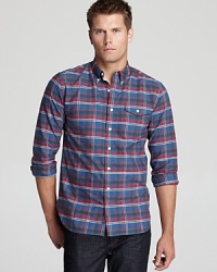 Color in the lines with this calm, cool and collected button-down, featuring yarn-dyed cotton for sharp tones that complement your overall look. Color in the lines with this calm, cool and collected button-down, featuring yarn-dyed cotton for sharp tones that complement your overall look.