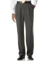 Stand for tradition. Classic double-pleat pant has a handsome drape and timeless style that looks great on its own or paired with the two-button blazer for an elegant suit. Engineered Waistband: Can stretch one inch on each side. On-seam pockets. Button-through back pockets. Finished with a 1.5 cuff.