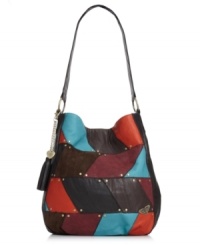 Bring a patchwork approach to your accessories arsenal with this groovy retro renegade from Roxy. Cool colors and edgy stud accents lend interest to the outside, while plenty of pockets offer praciality within. Bring a patchwork approach to your accessories arsenal with this groovy retro renegade from Roxy. Cool colors and edgy stud accents lend interest to the outside, while plenty of pockets offer praciality within.