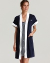 A soft terry short sleeve robe with white banding for a spa-like look.