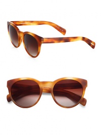 A retro-inspired frame crafted in lightweight acetate with gradient lens. Available in light havana with spice brown gradient lens. 100% UV protectionImported