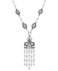 A tassel that's well worth it. Genevieve & Grace's sterling silver pendant features cultured freshwater pearls (4-4-1/2 mm) in a prominent fashion, as well as marcasite to enhance the appeal. Approximate length: 18 inches. Approximate drop: 1-3/4 inches. Approximate drop width: 1-1/8 inches. A tassel that's well worth it. Genevieve & Grace's sterling silver pendant features cultured freshwater pearls (4-4-1/2 mm) in a prominent fashion, as well as marcasite to enhance the appeal. Approximate length: 18 inches. Approximate drop: 1-3/4 inches. Approximate drop width: 1-1/8 inches.