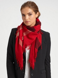 A vibrant check design is printed on this plush wool scarf with allover fringe trim.Wool43 X 43Dry cleanImported A vibrant check design is printed on this plush wool scarf with allover fringe trim.Wool43 X 43Dry cleanImported