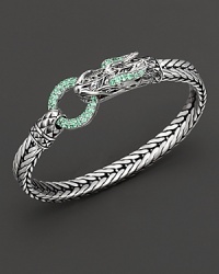 Eastern elements inform John Hardy's dragon head bracelet, featuring a polished silver link band and dragon head clasp with tsavorite. Eastern elements inform John Hardy's dragon head bracelet, featuring a polished silver link band and dragon head clasp with tsavorite.