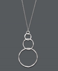 Light and airy, this subtle style perfects any look. Studio Silver's pretty pendant features three graduated, interlocking rings in sterling silver. Approximate length: 16 inches. Approximate drop: 1-3/4 inches.