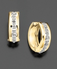 Pavé diamond accents and a soft, rounded shape lend a modern edge to traditional 14k gold hoop earrings . Pavé diamond accents and a soft, rounded shape lend a modern edge to traditional 14k gold hoop earrings .