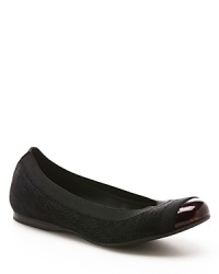 Stuart Weitzman dances into the cap toe trend in these versatile, updated ballet flats. Stuart Weitzman dances into the cap toe trend in these versatile, updated ballet flats.