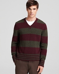 Bold stripes adorn this luxe wool v-neck sweater from Jack Spade. Bold stripes adorn this luxe wool v-neck sweater from Jack Spade.