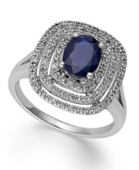 Richly colored and precisely detailed, this unique ring features a dramatic design of round-cut diamonds in a three ring pattern (1/4 ct. t.w.) and an oval-cut sapphire at center (1-5/8 ct. t.w.). Crafted in 14k white gold.