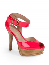 THE LOOKPeep toeCrisscross adjustable ankle strapPadded insoleStacked heel, 5 (125mm)Stacked platform, 1 (25mm)Compares to a 4 heel (100mm)THE MATERIALPatent leather upperLeather lining and soleORIGINImported THE LOOKPeep toeCrisscross adjustable ankle strapPadded insoleStacked heel, 5 (125mm)Stacked platform, 1 (25mm)Compares to a 4 heel (100mm)THE MATERIALPatent leather upperLeather lining and soleORIGINImported