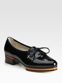 Lace-up patent leather basic thoughtfully constructed with contrasting inserts and grosgrain ribbon trim. Stacked heel with patent leather insert, 1 (25mm)Platform with patent leather insert, ½ (15mm)Compares to a ½ heel (15mm)Patent leather and grosgrain ribbon upperLeather lining and solePadded insoleMade in ItalyOUR FIT MODEL RECOMMENDS ordering one half size up as this style runs small. Lace-up patent leather basic thoughtfully constructed with contrasting inserts and grosgrain ribbon trim. Stacked heel with patent leather insert, 1 (25mm)Platform with patent leather insert, ½ (15mm)Compares to a ½ heel (15mm)Patent leather and grosgrain ribbon upperLeather lining and solePadded insoleMade in ItalyOUR FIT MODEL RECOMMENDS ordering one half size up as this style runs small.