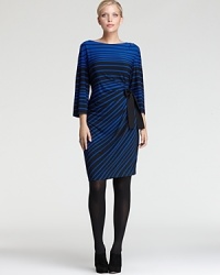 The graphic jolt of variegated stripes lends serious fashion presence to a Taylor Dresses Plus sheath dress, cinched with a tie belt for feminine impact. The graphic jolt of variegated stripes lends serious fashion presence to a Taylor Dresses Plus sheath dress, cinched with a tie belt for feminine impact.