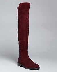 A Stuart Weitzman, wear-with-everything favorite, these sleek, stylish suede boots feature stretch backs that make for the perfect, long-and-lanky fit: Hello, legs! A Stuart Weitzman, wear-with-everything favorite, these sleek, stylish suede boots feature stretch backs that make for the perfect, long-and-lanky fit: Hello, legs!