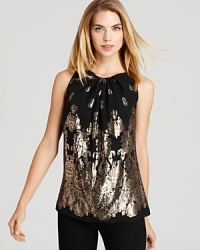 A beautiful, gold-dusted floral print blooms upon this festive Tegan top flaunting fall's most hotly-pursued trend--metallic shine! A beautiful, gold-dusted floral print blooms upon this festive Tegan top flaunting fall's most hotly-pursued trend--metallic shine!