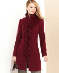Elegant lines and a cascade of structured ruffles make this wool-blend coat from Tahari a true masterpiece. Elegant lines and a cascade of structured ruffles make this wool-blend coat from Tahari a true masterpiece.