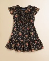 An array of ruffles on floral-print chiffon makes for a pretty season-spanning dress.Ruffled collarRuffled flutter sleevesCross-front topRuffled skirtPolyesterMachine washImported