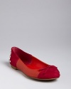 These DV Dolce Vita ballets will never leave you flat, in bold color with striking, studded heels.