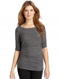 THE LOOKTextured wave designRound necklineThree-quarter sleeves with ruched detailsRuched sidesTHE FITAbout 23 from shoulder to hemTHE MATERIALPolyester/rayonCARE & ORIGINMachine washImportedModel shown is 5'9 (175cm) wearing US size Small. THE LOOKTextured wave designRound necklineThree-quarter sleeves with ruched detailsRuched sidesTHE FITAbout 23 from shoulder to hemTHE MATERIALPolyester/rayonCARE & ORIGINMachine washImportedModel shown is 5'9 (175cm) wearing US size Small.