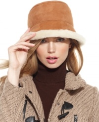 Opt for adorable accessorizing this winter with this impossibly chic shearling hat from Surell that keeps you cozy and on-trend. Opt for adorable accessorizing this winter with this impossibly chic shearling hat from Surell that keeps you cozy and on-trend.