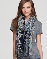 This iconic Missoni scarf in a signature zig-zag pattern is enlivened by a navy and green palette, in finely spun chenille. This iconic Missoni scarf in a signature zig-zag pattern is enlivened by a navy and green palette, in finely spun chenille.