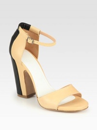 An adjustable ankle strap completes this elevated leather silhouette in dramatically contrasting tones. Self-covered heel, 4 (100mm)Leather upperAdjustable ankle strapLeather lining and solePadded insoleMade in Italy An adjustable ankle strap completes this elevated leather silhouette in dramatically contrasting tones. Self-covered heel, 4 (100mm)Leather upperAdjustable ankle strapLeather lining and solePadded insoleMade in Italy