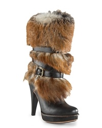 Foxy: these fashion-forward UGG® Australia boots combine high style looks with statement-making, luxe tipped Toscana fur shafts, with wearable platforms. Foxy: these fashion-forward UGG® Australia boots combine high style looks with statement-making, luxe tipped Toscana fur shafts, with wearable platforms.