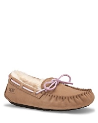 UGG® Australia Dakota moccasins keeps your feet warm, comfortable and cozy with shearling lining to wick moisture away with and indoor/outdoor sole. UGG® Australia Dakota moccasins keeps your feet warm, comfortable and cozy with shearling lining to wick moisture away with and indoor/outdoor sole.