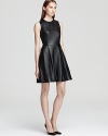 Buttery soft leather takes on a ladylike look on this simple sheath from Shoshanna.