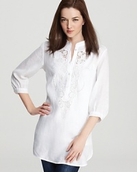 Rendered in a crisp white linen, this BASLER tunic flaunts billowy sleeves and a touch of delicate embroidery, proving that simple really is sweet. Rendered in a crisp white linen, this BASLER tunic flaunts billowy sleeves and a touch of delicate embroidery, proving that simple really is sweet.