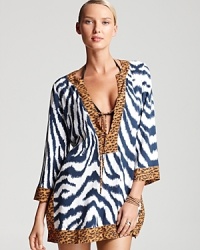 Stripes or spots? Have both exotic prints in one stylish swimsuit coverup with this ViX tunic, which will add sophisticated, get-noticed style to all your poolside favorites. Stripes or spots? Have both exotic prints in one stylish swimsuit coverup with this ViX tunic, which will add sophisticated, get-noticed style to all your poolside favorites.