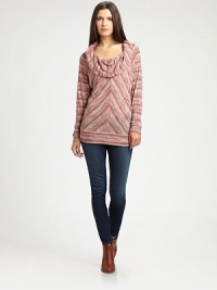 Artful chevron-inspired stripes surround this lengthy, ultra-soft cowlneck top. CowlneckLong sleevesBanded hem hits below the hips83% rayon/17% polyesterDry cleanMade in USAModel shown is 5'10 (177cm) wearing US size Small. Artful chevron-inspired stripes surround this lengthy, ultra-soft cowlneck top. CowlneckLong sleevesBanded hem hits below the hips83% rayon/17% polyesterDry cleanMade in USAModel shown is 5'10 (177cm) wearing US size Small.